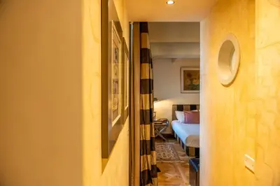 Letto o letti in una camera di L'Alcova di Giotto