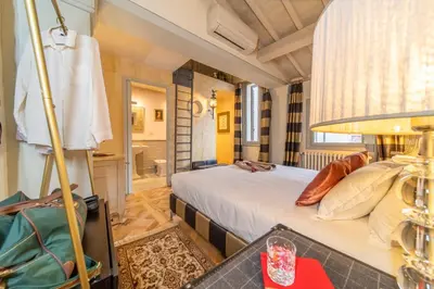 Letto o letti in una camera di L'Alcova di Giotto
