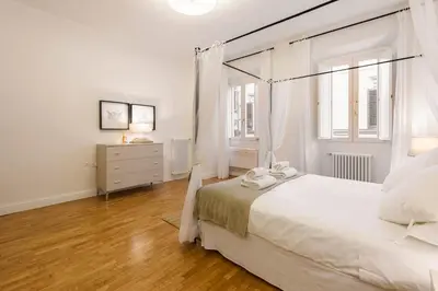 Letto o letti in una camera di San Frediano Stile by Mmega