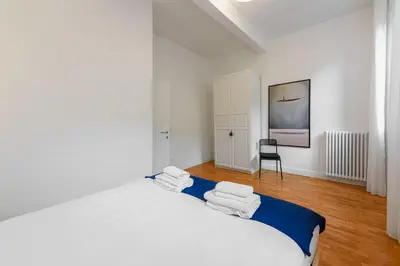 Letto o letti in una camera di San Frediano Stile by Mmega