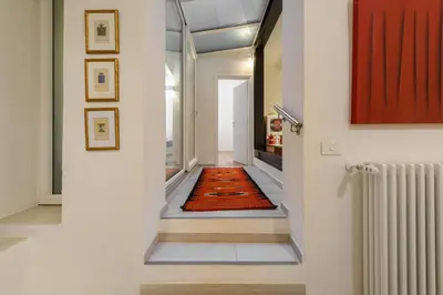 Letto o letti in una camera di San Frediano Stile by Mmega