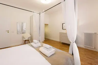 Letto o letti in una camera di San Frediano Stile by Mmega