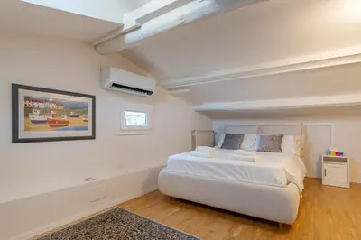 Letto o letti in una camera di Shiny Florence