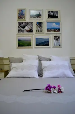 Letto o letti in una camera di Pontevecchio Relais