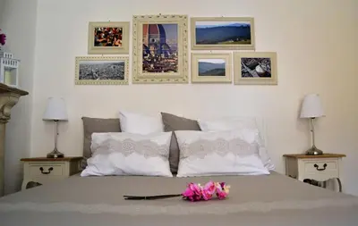 Letto o letti in una camera di Pontevecchio Relais
