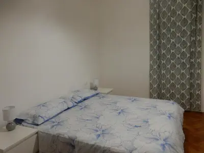 Letto o letti in una camera di Michelangelo Home
