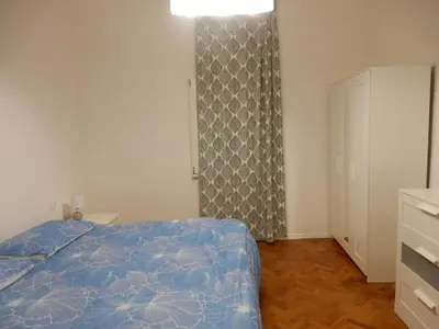 Letto o letti in una camera di Michelangelo Home