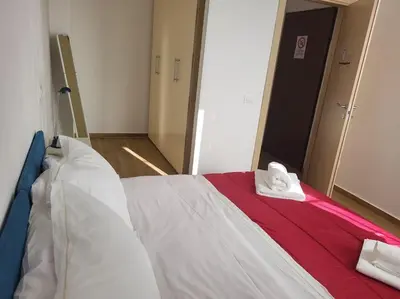 Letto o letti in una camera di Casa Patti Firenze