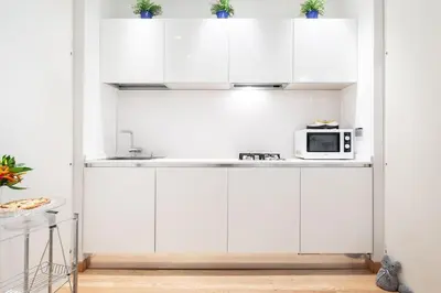 Cucina o angolo cottura di Santa Croce Loft di design