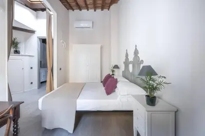 Letto o letti in una camera di Borgo La Noce ONE