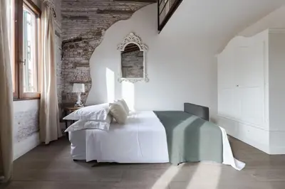 Letto o letti in una camera di Borgo La Noce TWO