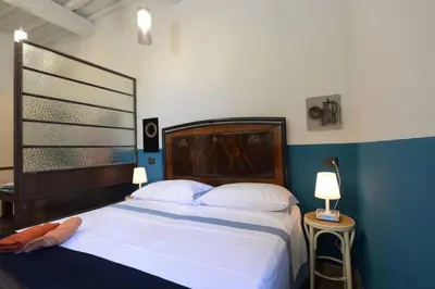 Letto o letti in una camera di Mugnone house