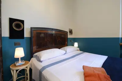 Letto o letti in una camera di Mugnone house