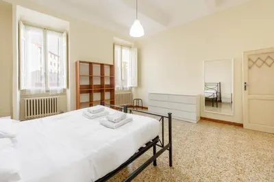 Letto o letti in una camera di Lorena Firenze by Mmega