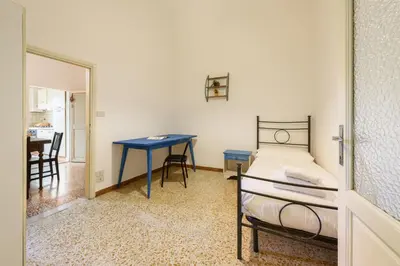 Letto o letti in una camera di Lorena Firenze by Mmega