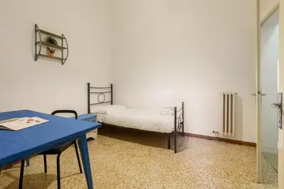 Letto o letti in una camera di Lorena Firenze by Mmega