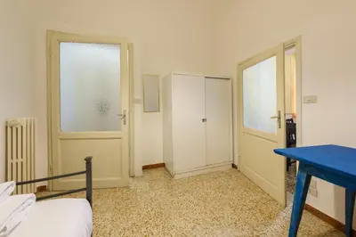 Letto o letti in una camera di Lorena Firenze by Mmega