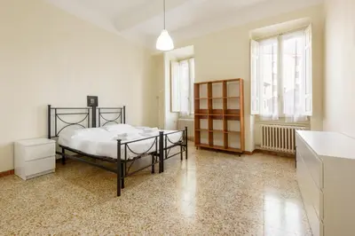 Letto o letti in una camera di Lorena Firenze by Mmega