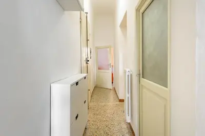 Letto o letti in una camera di Lorena Firenze by Mmega