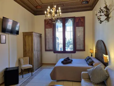 Letto o letti in una camera di B&B Firenze 400