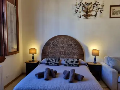 Letto o letti in una camera di B&B Firenze 400