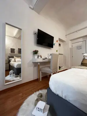 Letto o letti in una camera di La Vigna Dolce di Anna