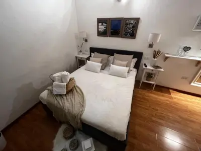 Letto o letti in una camera di La Vigna Dolce di Anna