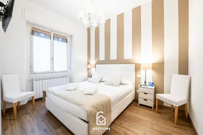 Letto o letti in una camera di 20 Minuti Ponte Vecchio - Delizioso Appartamento