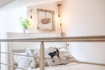 Letto o letti in una camera di Quiet Hideway 650ft ponte Vecchio COSTA61