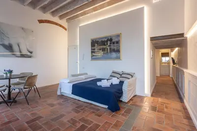 Letto o letti in una camera di Ognissanti Family Suite in great location