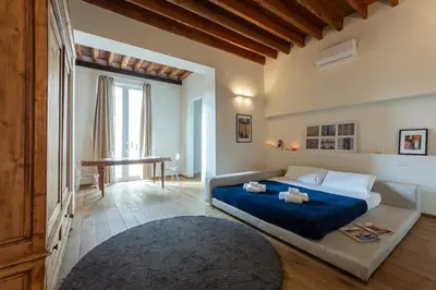 Letto o letti in una camera di OGNISSANTI Romantic Suite