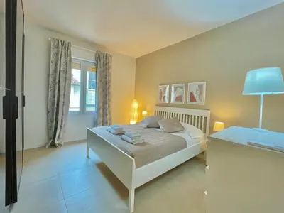 Letto o letti in una camera di Appartamento San Iacopino