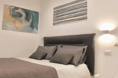 Letto o letti in una camera di Ponte Vecchio - Torre Dei Guelfi Apartment