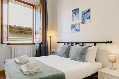 Letto o letti in una camera di Medicee Exclusive Penthouse