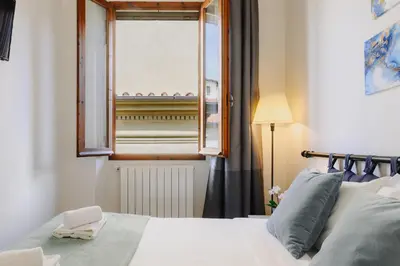 Letto o letti in una camera di Medicee Exclusive Penthouse