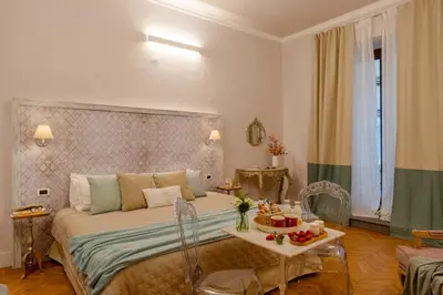 Letto o letti in una camera di Accanto Al Centro B&B