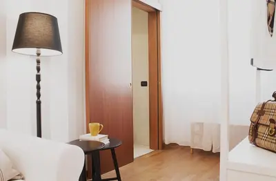 Letto o letti in una camera di Accanto Al Centro B&B
