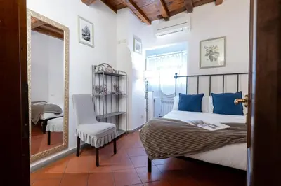 Letto o letti in una camera di Gina Guest House