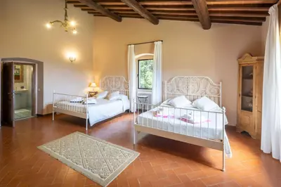 Letto o letti in una camera di Villa la Selva by VacaVilla