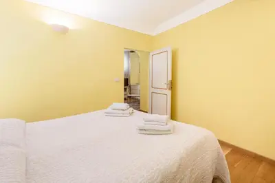 Letto o letti in una camera di Il Nido di Santa Croce by Mmega