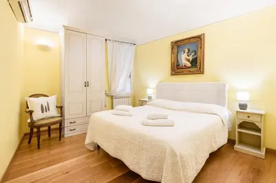 Letto o letti in una camera di Il Nido di Santa Croce by Mmega
