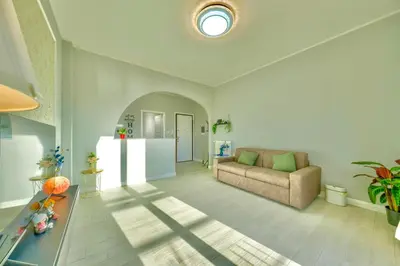 Area soggiorno di T&F HOUSE Comfortable Apartment with Private Parking