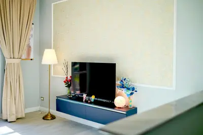 TV o dispositivi per l'intrattenimento presso T&F HOUSE Comfortable Apartment with Private Parking