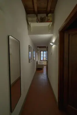 Letto o letti in una camera di Traditional Florentine 1BR apartment close to Piazza Santa Croce