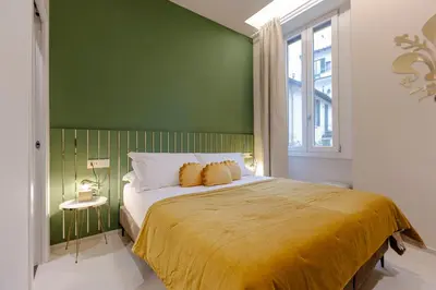 Letto o letti in una camera di FLORENCE SEASONS B&B