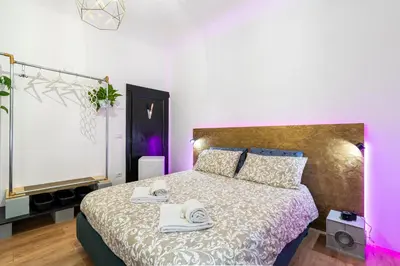 Letto o letti in una camera di Lovely Apartment 10 min dal centro e Piazzale Michelangelo