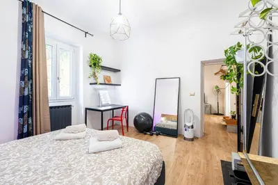Letto o letti in una camera di Lovely Apartment 10 min dal centro e Piazzale Michelangelo
