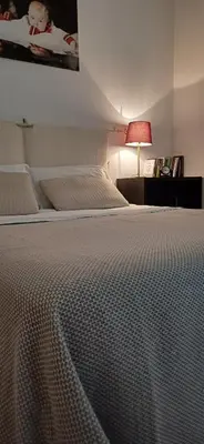 Letto o letti in una camera di Leopoldo home