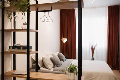 Letto o letti in una camera di B/Loft