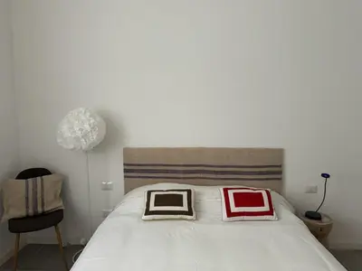 Letto o letti in una camera di The Savonarola Residence